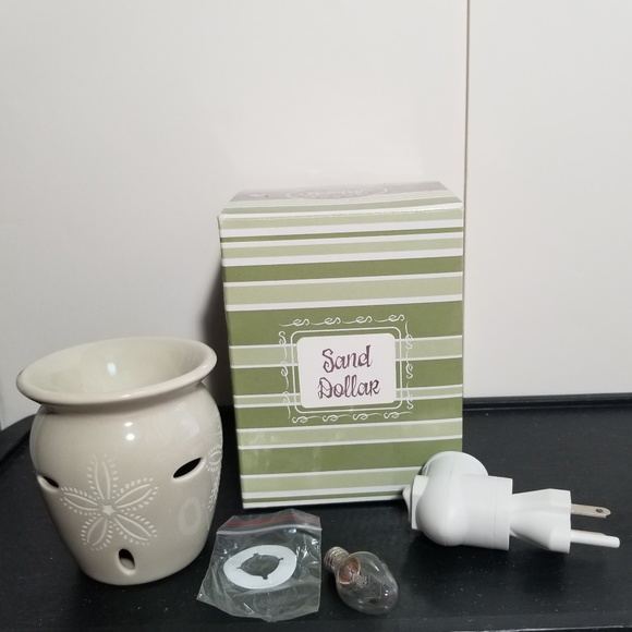 Scentsy Other - NWT Scentsy Sand Dollar Plug in Warmer Scentsy Other - NWT Scentsy Sand Dollar Plug in Warmer